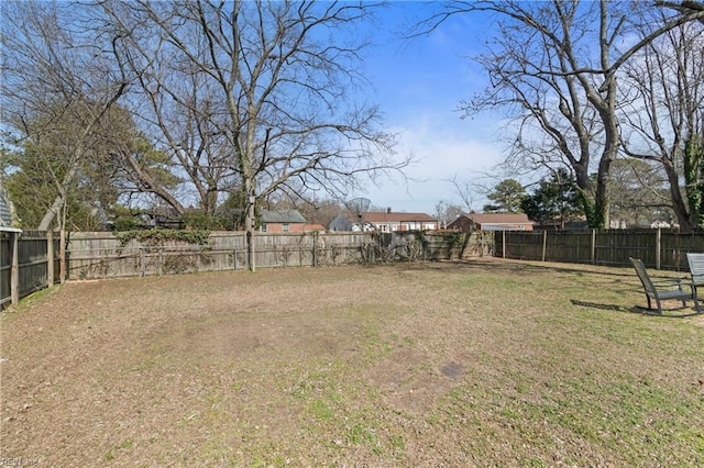 view of yard featuring a fenced backyard