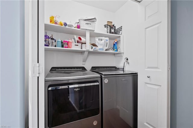 laundry room with laundry area and washing machine and dryer