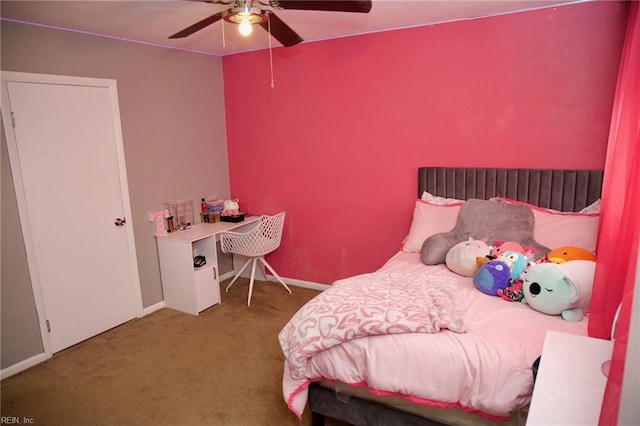 bedroom featuring carpet floors, ceiling fan, and baseboards