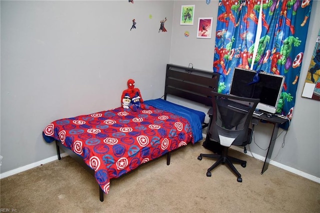 bedroom with carpet and baseboards