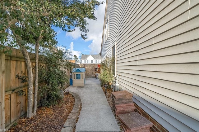 view of yard featuring a patio area and a fenced backyard