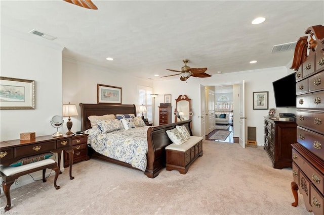 bedroom with light carpet, recessed lighting, visible vents, and crown molding