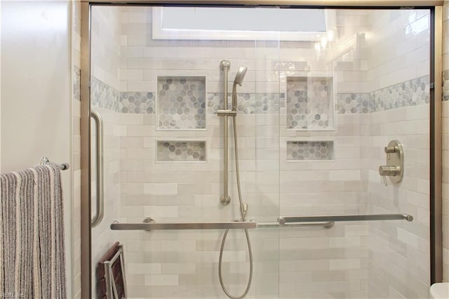 full bath featuring a stall shower