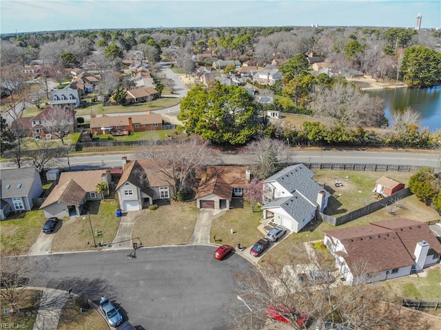 aerial view with a water view and a residential view