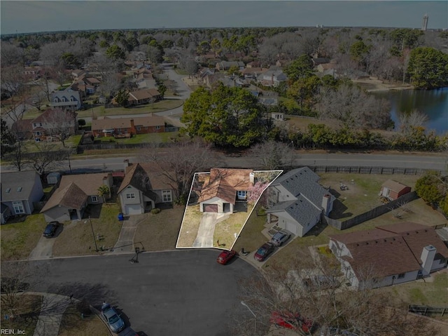 aerial view featuring a water view and a residential view