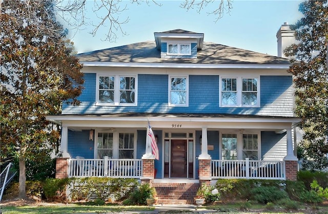 traditional style home with a porch