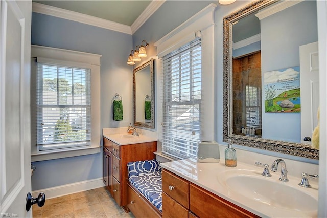 full bathroom featuring two vanities, ornamental molding, a sink, tile patterned flooring, and baseboards