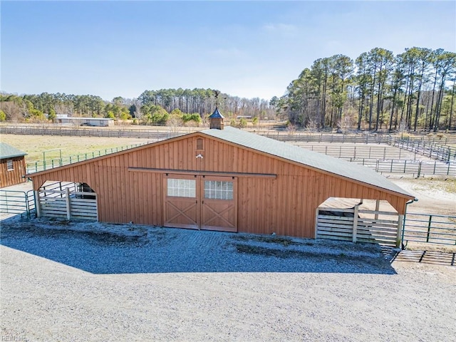 view of outbuilding featuring an outbuilding and an exterior structure