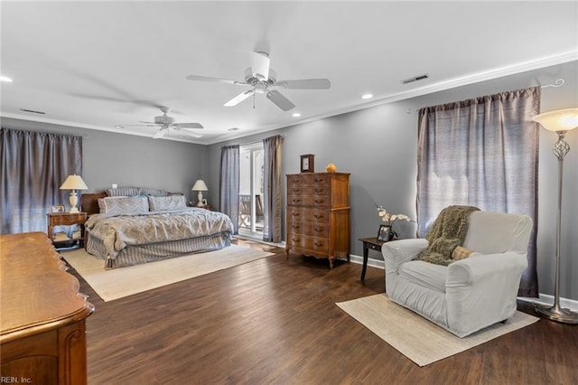 bedroom with recessed lighting, visible vents, baseboards, and wood finished floors