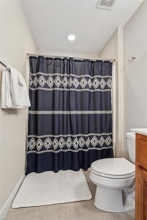 bathroom with toilet, tile patterned floors, vanity, visible vents, and a shower with curtain