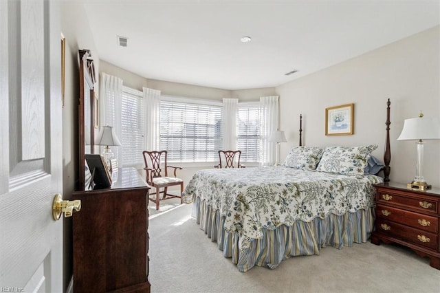 bedroom featuring visible vents and carpet flooring