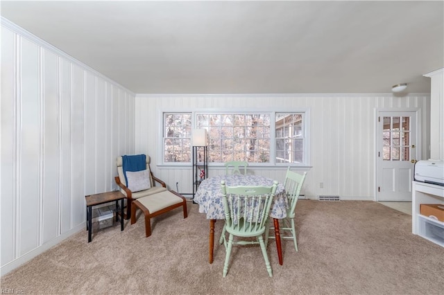 dining space with visible vents and carpet flooring