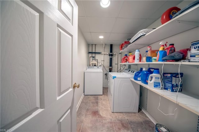 laundry area featuring laundry area, recessed lighting, and separate washer and dryer