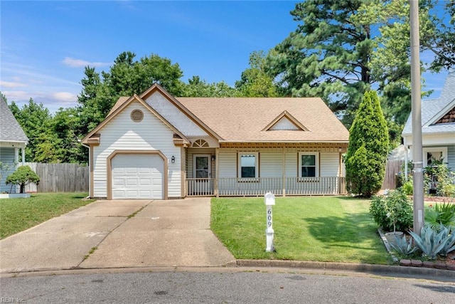 view of front facade with covered porch, an attached garage, fence, driveway, and a front lawn