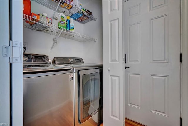 laundry area featuring laundry area and separate washer and dryer