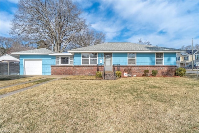 single story home featuring a garage, brick siding, fence, and a front lawn