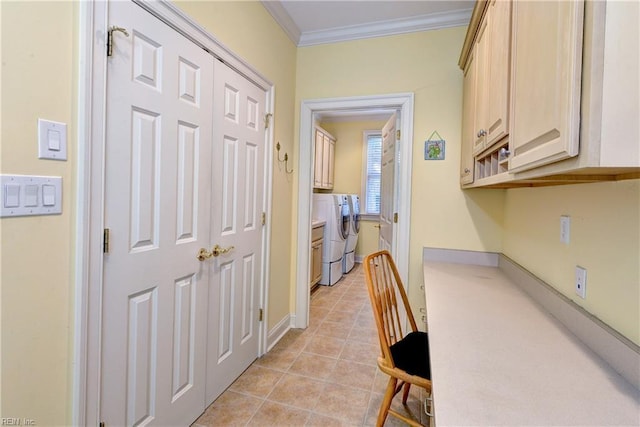 corridor featuring ornamental molding, washer and clothes dryer, and light tile patterned floors