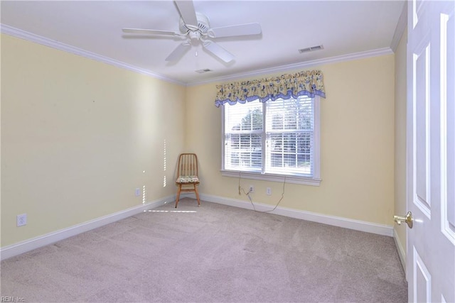 unfurnished room featuring carpet flooring, visible vents, a ceiling fan, baseboards, and ornamental molding