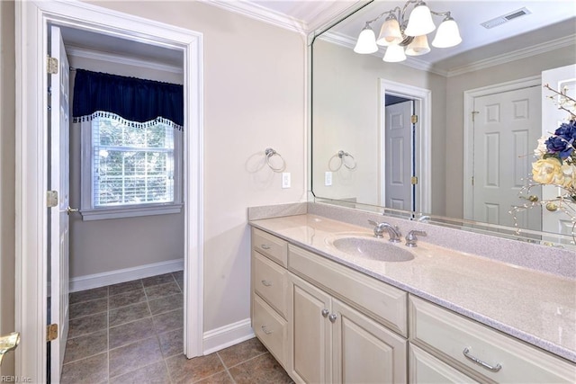 bathroom with tile patterned flooring, vanity, visible vents, baseboards, and ornamental molding