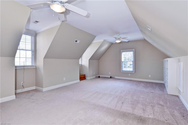 bonus room featuring carpet, plenty of natural light, and visible vents