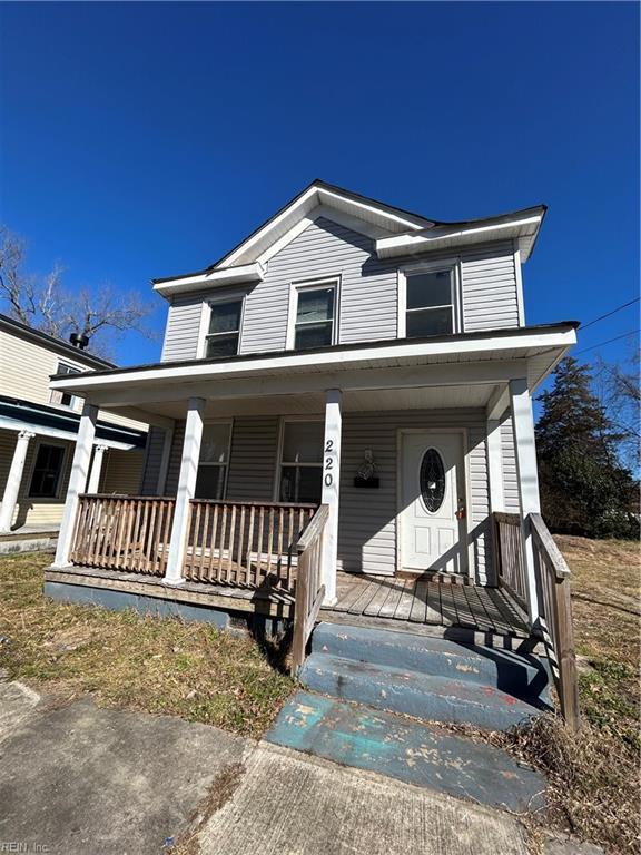 view of front of property featuring covered porch