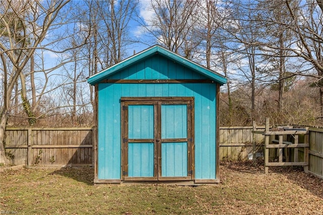 view of shed featuring a fenced backyard