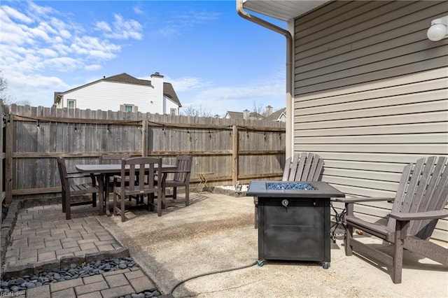 view of patio / terrace featuring outdoor dining space and fence