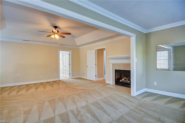 unfurnished living room featuring carpet floors, ornamental molding, and baseboards