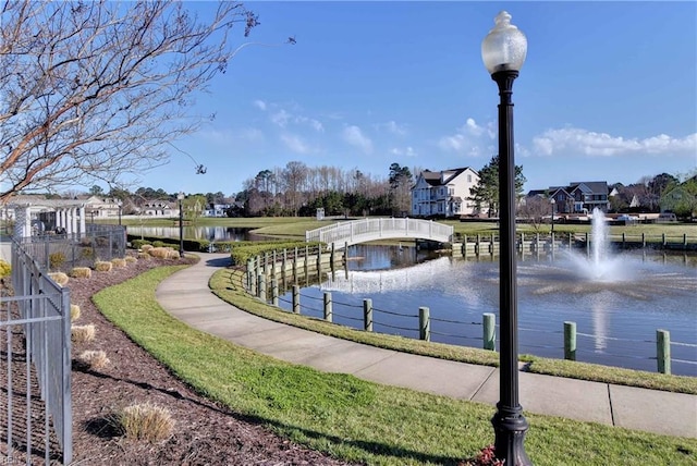 view of home's community featuring a water view