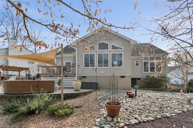 back of property with a patio area, outdoor lounge area, a wooden deck, and a pergola