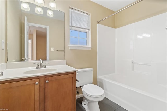 full bathroom featuring shower / bathing tub combination, vanity, toilet, and tile patterned floors