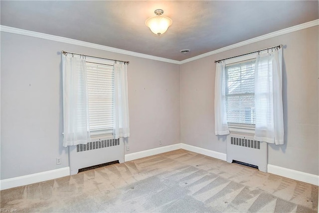 carpeted empty room featuring baseboards, radiator heating unit, and crown molding