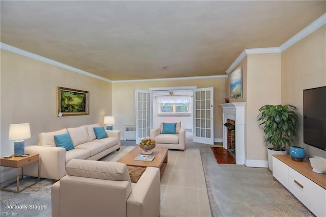 living area with radiator heating unit, a fireplace, baseboards, and ornamental molding