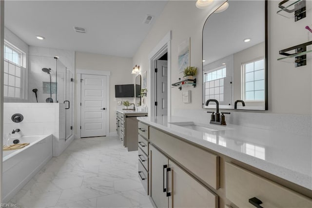 bathroom with marble finish floor, visible vents, a sink, a shower stall, and a bath