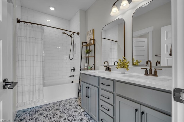 bathroom featuring double vanity, tile patterned floors, a sink, and shower / tub combo with curtain