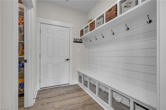 mudroom with light wood-style flooring