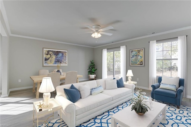 living room with light wood finished floors, plenty of natural light, baseboards, and crown molding