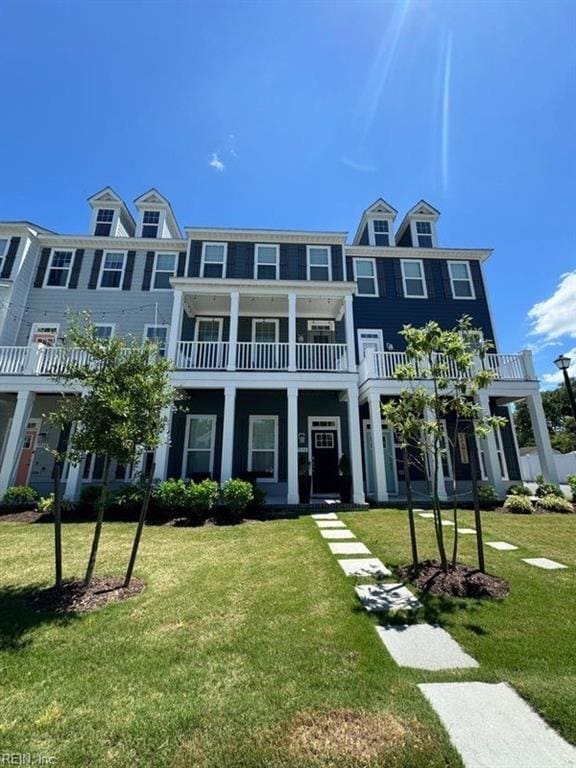 view of front of home with a front yard