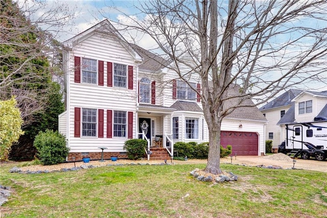 traditional home featuring concrete driveway, an attached garage, and a front lawn