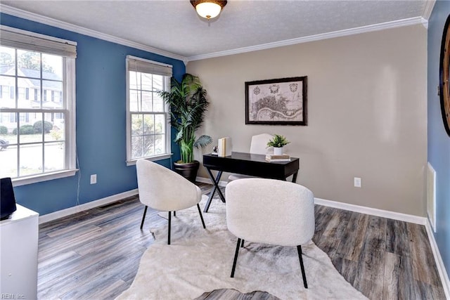 office with a textured ceiling, baseboards, crown molding, and wood finished floors