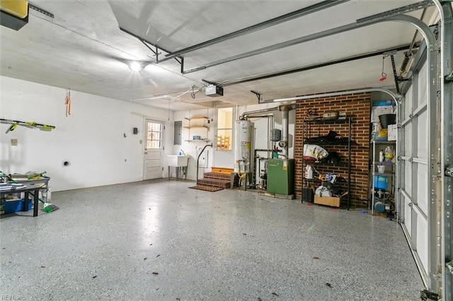 garage with a garage door opener, gas water heater, and electric panel