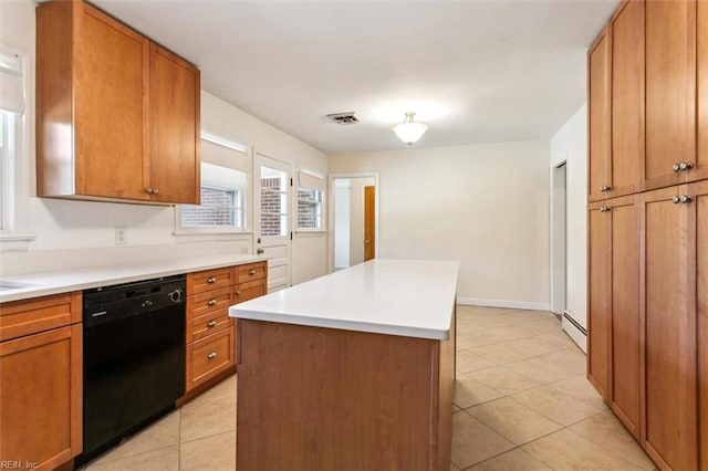 kitchen with light tile patterned flooring, visible vents, black dishwasher, baseboard heating, and brown cabinetry