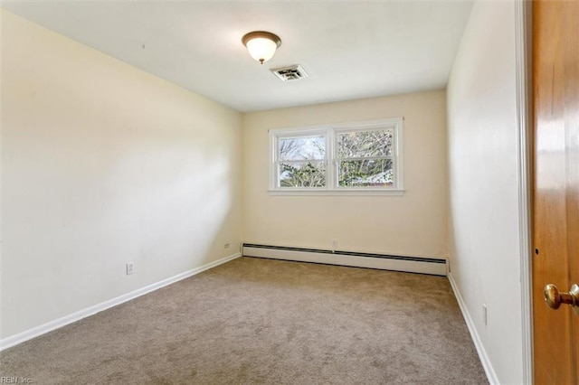 carpeted empty room with baseboards, visible vents, and baseboard heating