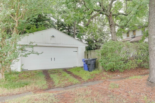 detached garage with fence