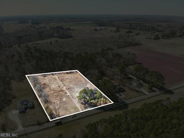 birds eye view of property featuring a rural view