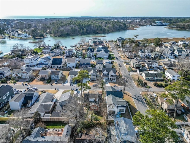 bird's eye view with a residential view and a water view