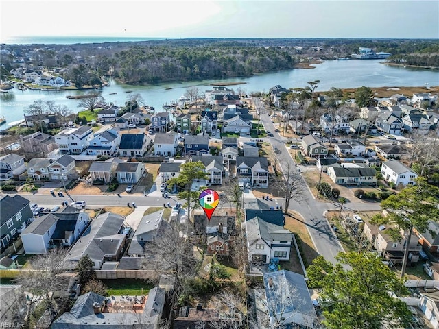 aerial view featuring a water view and a residential view