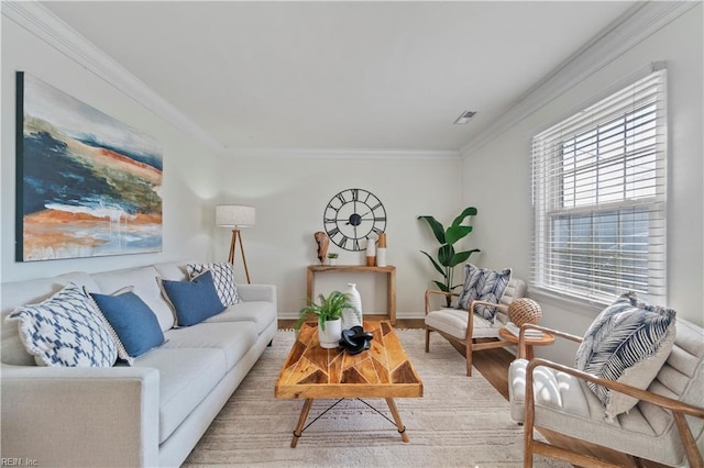 living area featuring ornamental molding, visible vents, baseboards, and wood finished floors