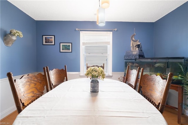 dining area featuring wood finished floors