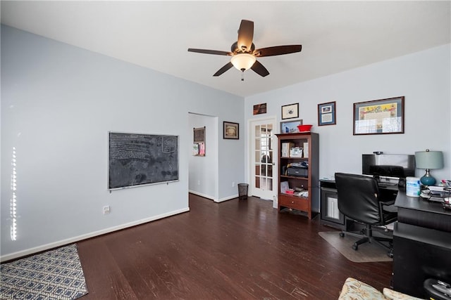 home office featuring ceiling fan, baseboards, and wood finished floors